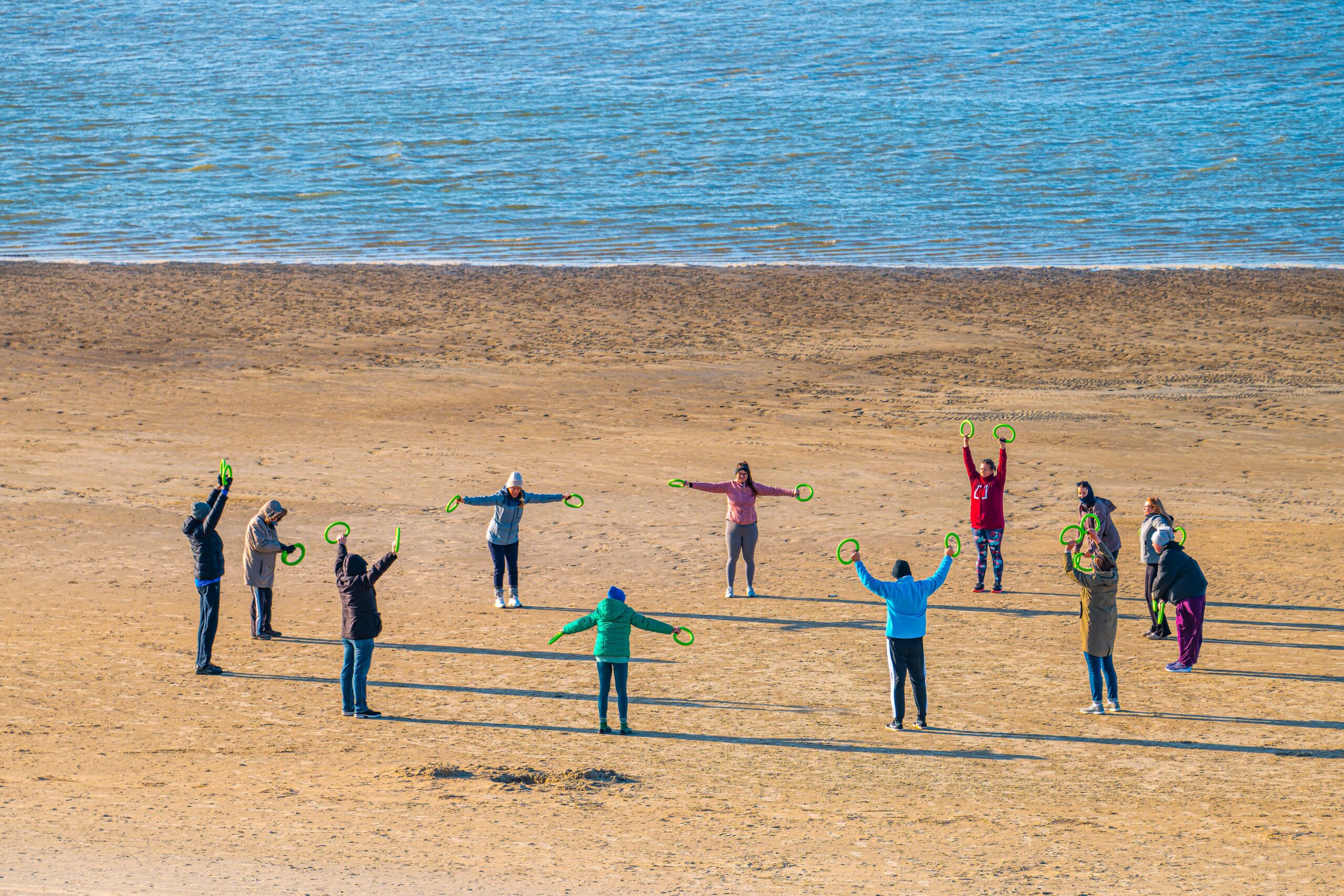 Team-building with a group on the beach
